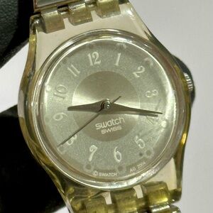 Swatch AG2004 Clear Resin Silver Dial Ladies’ 25mm Swiss-Made Dress Watch